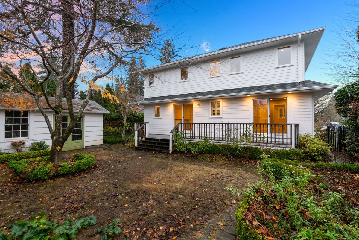 Alameda home with its new second story, at dusk
