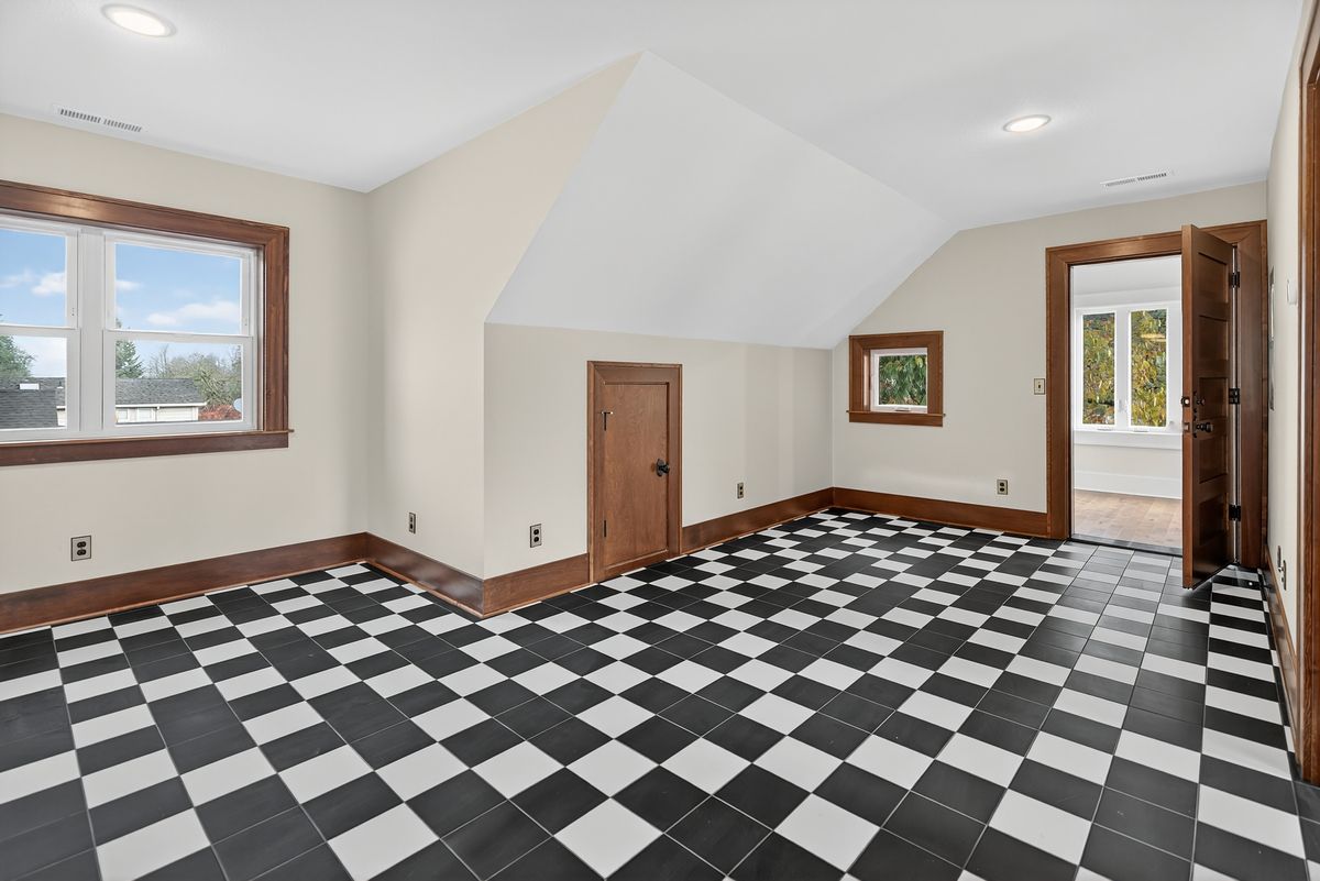 North Portland ADU — upper-floor living space with checkerboard tile