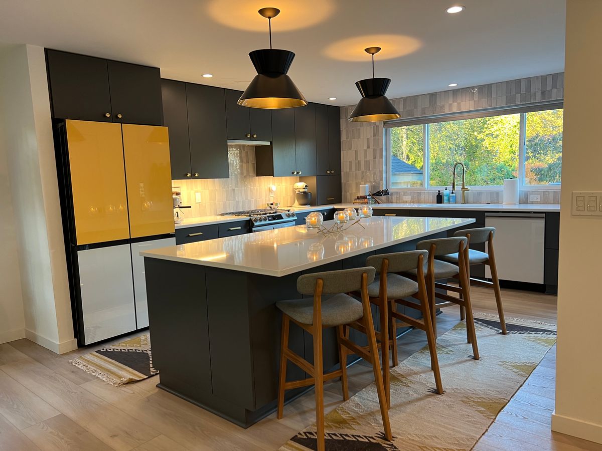 SW Portland whole-home remodel — kitchen with yellow refrigerator and black cabinetry